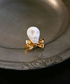 リング,指輪,ジュエリー,アクセサリー,ribbon,リボン,scull,ユニーク,ギフト,ジェンダーレス,モード,silver,ring,jewelry,スカル,gift,unisex,mode,metal,モチーフ,accessory,motif,ドクロ
